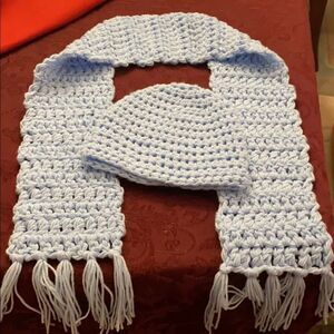 homemade crocheted baby blue hat and scarf set